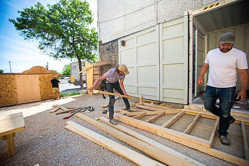 MIKAELA MACKENZIE / WINNIPEG FREE PRESS

Jeremy Ritsema (left) and Brad Chute, Beer Can organizers, work on putting together a deck in the new live music venue and pop-up beer tent area in Winnipeg on Wednesday, June 3, 2020. For Al Small story.
Winnipeg Free Press 2020.