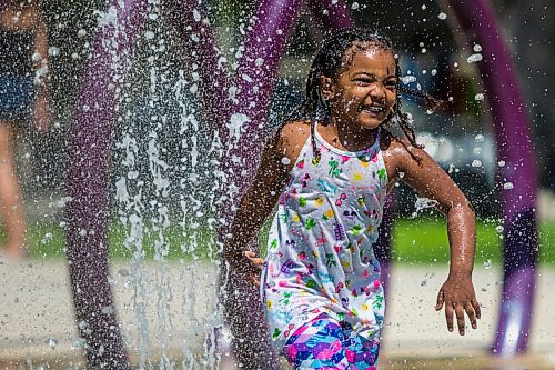 MIKAELA MACKENZIE / WINNIPEG FREE PRESS

Blane Geberslasie plays at the splash pad at Central Park on the first day of re-opening in Winnipeg on Wednesday, June 3, 2020. For Kellen story.
Winnipeg Free Press 2020.