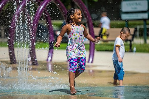 MIKAELA MACKENZIE / WINNIPEG FREE PRESS

Blane Geberslasie plays at the splash pad at Central Park on the first day of re-opening in Winnipeg on Wednesday, June 3, 2020. For Kellen story.
Winnipeg Free Press 2020.