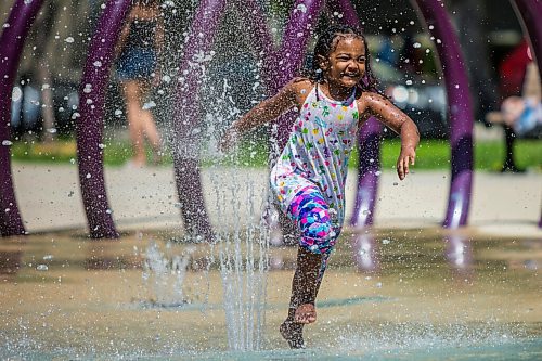 MIKAELA MACKENZIE / WINNIPEG FREE PRESS

Blane Geberslasie plays at the splash pad at Central Park on the first day of re-opening in Winnipeg on Wednesday, June 3, 2020. For Kellen story.
Winnipeg Free Press 2020.