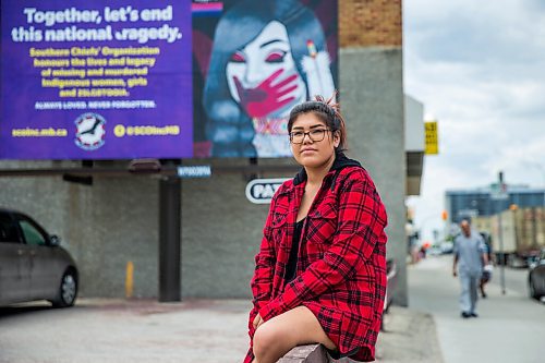 MIKAELA MACKENZIE / WINNIPEG FREE PRESS

Artist Ida Bruyere poses for a portrait in front of a MMIWG billboard with her art on it at Notre Dame Avenue and Edmonton Street in Winnipeg on Wednesday, June 3, 2020. For Malak Abas story.
Winnipeg Free Press 2020.