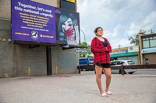 MIKAELA MACKENZIE / WINNIPEG FREE PRESS

Artist Ida Bruyere poses for a portrait in front of a MMIWG billboard with her art on it at Notre Dame Avenue and Edmonton Street in Winnipeg on Wednesday, June 3, 2020. For Malak Abas story.
Winnipeg Free Press 2020.