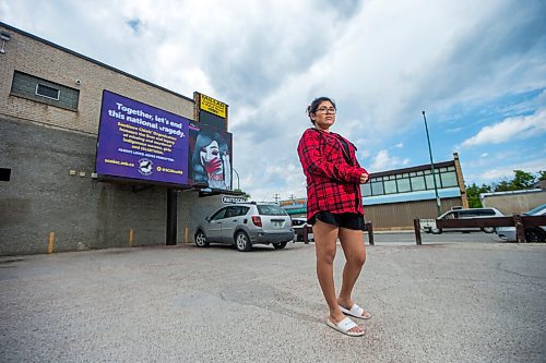 MIKAELA MACKENZIE / WINNIPEG FREE PRESS

Artist Ida Bruyere poses for a portrait in front of a MMIWG billboard with her art on it at Notre Dame Avenue and Edmonton Street in Winnipeg on Wednesday, June 3, 2020. For Malak Abas story.
Winnipeg Free Press 2020.