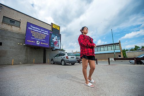 MIKAELA MACKENZIE / WINNIPEG FREE PRESS

Artist Ida Bruyere poses for a portrait in front of a MMIWG billboard with her art on it at Notre Dame Avenue and Edmonton Street in Winnipeg on Wednesday, June 3, 2020. For Malak Abas story.
Winnipeg Free Press 2020.