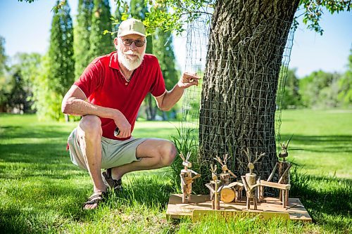 MIKAELA MACKENZIE / WINNIPEG FREE PRESS

Paul Leullier, artist and woodworker, with his whimsical reindeer sculptures at Grants Old Mill park in Winnipeg on Wednesday, June 3, 2020. Leullier created these sculptures and installed them in the greenspace during the pandemic as a way to cheer people up. For Brenda Suderman story.
Winnipeg Free Press 2020.