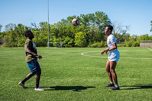 MIKAELA MACKENZIE / WINNIPEG FREE PRESS

Raphael Ohin (left) and Solomon Kojo Antwi juggle the ball at Glenlawn Collegiate Memorial Park Turf Field in Winnipeg on Thursday, June 4, 2020. Valour can resume training on Sunday in small groups. For Taylor Allen story.
Winnipeg Free Press 2020.