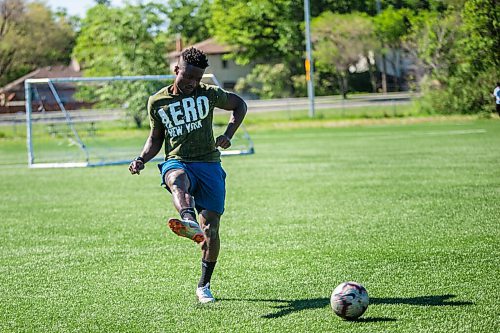 MIKAELA MACKENZIE / WINNIPEG FREE PRESS

Raphael Ohin passes the ball back and forth at Glenlawn Collegiate Memorial Park Turf Field in Winnipeg on Thursday, June 4, 2020. Valour can resume training on Sunday in small groups. For Taylor Allen story.
Winnipeg Free Press 2020.