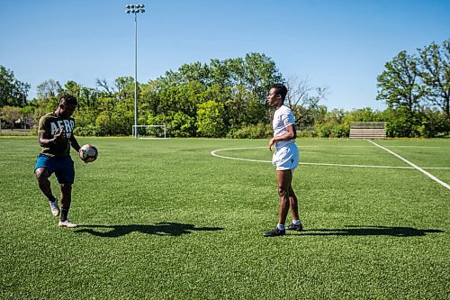 MIKAELA MACKENZIE / WINNIPEG FREE PRESS

Raphael Ohin (left) and Solomon Kojo Antwi juggle the ball at Glenlawn Collegiate Memorial Park Turf Field in Winnipeg on Thursday, June 4, 2020. Valour can resume training on Sunday in small groups. For Taylor Allen story.
Winnipeg Free Press 2020.