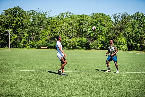 MIKAELA MACKENZIE / WINNIPEG FREE PRESS

Solomon Kojo Antwi (left) and Raphael Ohin juggle the ball at Glenlawn Collegiate Memorial Park Turf Field in Winnipeg on Thursday, June 4, 2020. Valour can resume training on Sunday in small groups. For Taylor Allen story.
Winnipeg Free Press 2020.