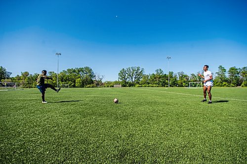 MIKAELA MACKENZIE / WINNIPEG FREE PRESS

Raphael Ohin (left) and Solomon Kojo Antwi pass the ball back and forth at Glenlawn Collegiate Memorial Park Turf Field in Winnipeg on Thursday, June 4, 2020. Valour can resume training on Sunday in small groups. For Taylor Allen story.
Winnipeg Free Press 2020.