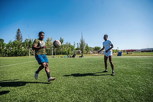 MIKAELA MACKENZIE / WINNIPEG FREE PRESS

Raphael Ohin (left) and Solomon Kojo Antwi juggle the ball at Glenlawn Collegiate Memorial Park Turf Field in Winnipeg on Thursday, June 4, 2020. Valour can resume training on Sunday in small groups. For Taylor Allen story.
Winnipeg Free Press 2020.