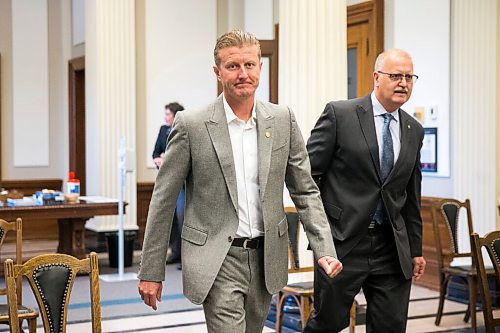 MIKAELA MACKENZIE / WINNIPEG FREE PRESS

MPI president and CEO Ben Graham (left) and board chair Mike Sullivan walk into the Standing Committee on Crown Corporations at the Manitoba Legislative Building in Winnipeg on Thursday, June 4, 2020. For Larry Kusch story.
Winnipeg Free Press 2020.