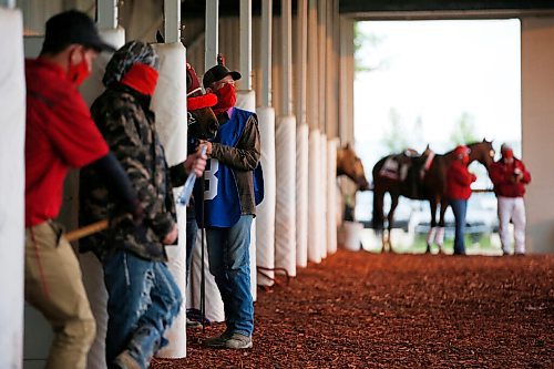 JOHN WOODS / WINNIPEG FREE PRESS
Horses get ready in the paddock for race 3 at Assiniboia Downs in Winnipeg Tuesday, June 9, 2020.