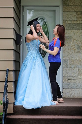 RUTH BONNEVILLE / WINNIPEG FREE PRESS

49.8 grads - Seven Oaks School. 

Jasmine Do, Seven Oaks Met School (17yrs), tries on her dress she purchased for her grad along with  a 2020 cap and gets some photos taken outside her home as her proud mom looks on. 

VIRUS GRADE 12 49.8: After 13 years in the K-12 education system, they were only months away from earning their diplomas, celebrating at grad pow wows and renting limos as backgrounds for their prom photos when the school year was called off. The celebrations they have long awaited have either been moved online, postponed or cancelled. The pandemic has seemingly targeted the Class of 2020, who will enter job markets or post-secondary at an unprecedented time, without many of the rites of passages the graduates before them took for granted. It sucks. We're going to be talking to tons of students about their final year and snapping photos of them in their formal attire, pow wow regalia and convocation gowns. (RUNNING JUNE 13) 


Maggie Macintosh
Education Reporter - Winnipeg Free Press

June 3,  2020