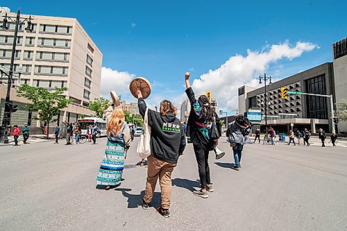 Mike Sudoma / Winnipeg Free Press
Protesters take to the streets as they participate in a round dance at City Hall to show their support after the city of Winnipeg evicted residents of a homeless camp along Henry St Wednesday afternoon
June 10, 2020