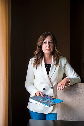 MIKAELA MACKENZIE / WINNIPEG FREE PRESS

Nadine Bartlett, an assistant professor of inclusive education at the U of M, poses for a portrait in her home with the report, which outlines the results of a summer 2019 exploratory study that looked into how seclusion/restraint is used on students with disabilities in Manitoba schools, in Winnipeg on Thursday, June 11, 2020. For Maggie Macintosh story.
Winnipeg Free Press 2020.