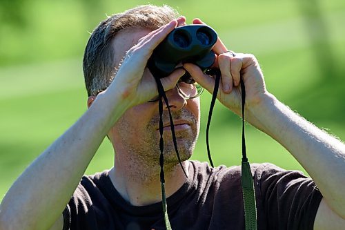 JESSE BOILY  / WINNIPEG FREE PRESS
Jeope Wolfe, a birder, looks out for birds at Omand's Creek on Thursday. Wolfe has been birding since childhood. Thursday, June 11, 2020.
Reporter: Declan