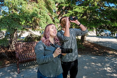 JESSE BOILY  / WINNIPEG FREE PRESS
Rachel Robinson, left, and her boyfriend Braden Hicks look for birds at the University of Manitoba on Friday. They both have had interest in birding for awhile but became more serious in the spring. Friday, June 12, 2020.
Reporter: Declan