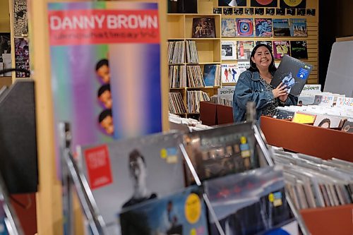 SHANNON VANRAES / WINNIPEG FREE PRESS
Frances Koncan browses at Into The Music in Winnipeg's Exchange District on June 12, 2020.