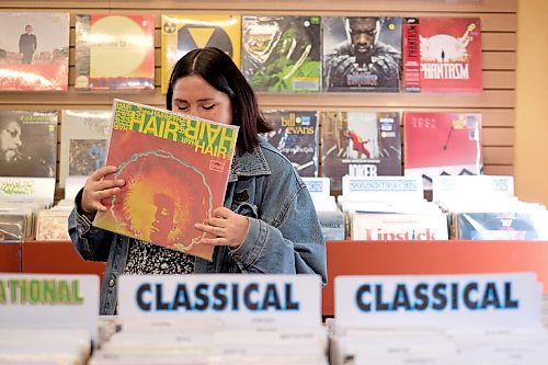 SHANNON VANRAES / WINNIPEG FREE PRESS
Frances Koncan browses at Into The Music in Winnipeg's Exchange District on June 12, 2020.