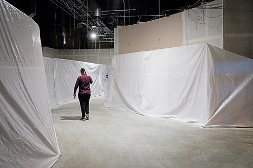 Daniel Crump / Winnipeg Free Press. A person walks through a tarped-off area at the Manitoba Museum. Despite reopening many exhibits at the museum are currently undergoing renovation and are scheduled to reopen in the fall. June 13, 2020.