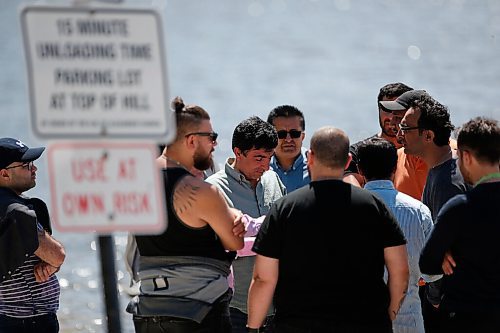 JOHN WOODS / WINNIPEG FREE PRESS
Members of the Kurdish community talk and await answers from a water search for a leading member of the community at Belair boat launch Sunday, June 14, 2020. One person died and another is missing after their boat capsized yesterday on Lake Winnipeg.