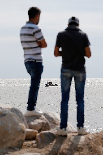JOHN WOODS / WINNIPEG FREE PRESS
Members of the Kurdish community await answers as they search for a leading member of the community on Lake Winnipeg close to Belair boat launch Sunday, June 14, 2020. One person died and another is missing after their boat capsized yesterday on Lake Winnipeg.