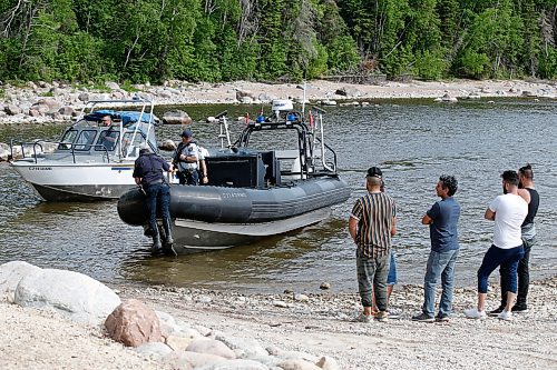 JOHN WOODS / WINNIPEG FREE PRESS
Members of the Kurdish community and family await answers from the RCMP after as they searched for a leading member of the community on Lake Winnipeg close to Belair boat launch Sunday, June 14, 2020. One person died and another is missing after their boat capsized yesterday on Lake Winnipeg.