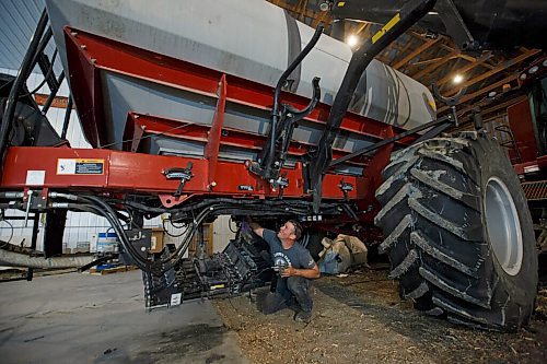 MIKE DEAL / WINNIPEG FREE PRESS
Grain farmer, Colin Penner, does some maintenance on his seeder so that it will be ready for next season.
See Eva Wasney 49.8 story
200525 - Monday, May 25, 2020.