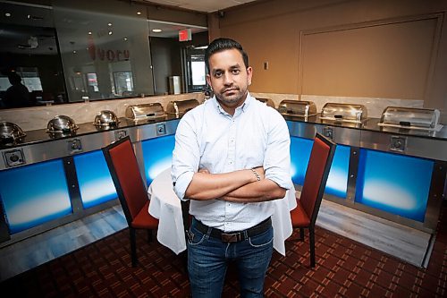 JOHN WOODS / WINNIPEG FREE PRESS
Manoj Choudhary, manager of Ivory Restaurant, is photographed in his buffet restaurant Monday, June 15, 2020. The restaurant is struggling because they are not allowed to serve their buffet due to COVID-19 restrictions.