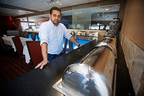 JOHN WOODS / WINNIPEG FREE PRESS
Manoj Choudhary, manager of Ivory Restaurant, is photographed in his buffet restaurant Monday, June 15, 2020. The restaurant is struggling because they are not allowed to serve their buffet due to COVID-19 restrictions.