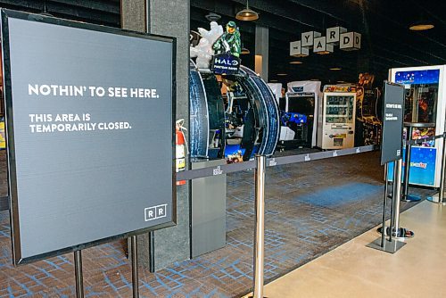 JESSE BOILY  / WINNIPEG FREE PRESS
Signs at the entrance of the Rec Room block off the arcade area to keep with social distancing efforts on Monday. Rec Room is slowly phasing their opening with the patio first.
 Monday, June 15, 2020.
Reporter: Randall King