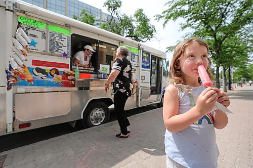 RUTH BONNEVILLE / WINNIPEG FREE PRESS

49.8 - Sis & Me food truck

Joyce & Garry Powers, Sis & Me food truck, parked at Broadway & Edmonton.  

Adele Matthews (5yrs), cools herself with a popsicle with her mom and brother Dylan (8yrs), over the lunch hour Tuesday. 

Story: This is for an Intersection piece on Sis & Me, a food truck celebrating its 25th anniversary on the streets of Winnipeg. Owners Joyce & Garry were one of two food trucks on Broadway when they started - mostly hot dog carts back then. They've been going strong ever since, and now that they're allowed back on the street - their license was delayed 'til May 1 this year owing to COVID - their reg customers are welcoming them back with open arms.


Story is due to run Sat June 20 - Dave Sanderson story,. 

June 16,  2020