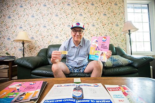 MIKAELA MACKENZIE / WINNIPEG FREE PRESS

Jeff Solylo, Winnipeg Whips fan, poses for a portrait with some of the team paraphernalia that he's kept from when he was a kid in Winnipeg on Tuesday, June 16, 2020. For Jason Bell story.
Winnipeg Free Press 2020.