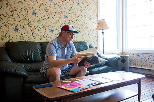 MIKAELA MACKENZIE / WINNIPEG FREE PRESS

Jeff Solylo, Winnipeg Whips fan, poses for a portrait with some of the team paraphernalia that he's kept from when he was a kid in Winnipeg on Tuesday, June 16, 2020. For Jason Bell story.
Winnipeg Free Press 2020.