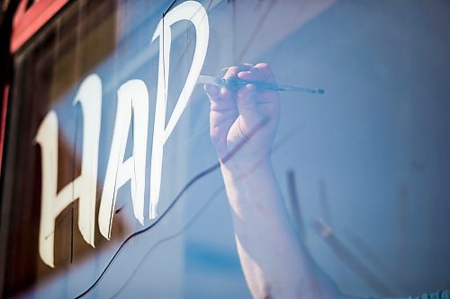 MIKAELA MACKENZIE / WINNIPEG FREE PRESS

Todd Van Hussen paints Canada Day window art at The Crusty Bun in Winnipeg on Wednesday, June 17, 2020. For Ben Waldman story.
Winnipeg Free Press 2020.