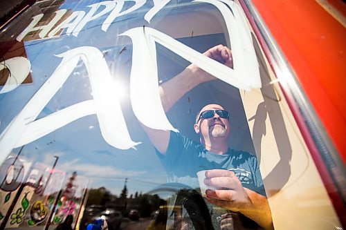 MIKAELA MACKENZIE / WINNIPEG FREE PRESS

Todd Van Hussen paints Canada Day window art at The Crusty Bun in Winnipeg on Wednesday, June 17, 2020. For Ben Waldman story.
Winnipeg Free Press 2020.