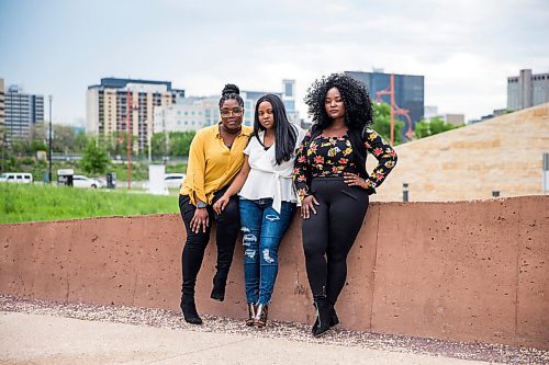 MIKAELA MACKENZIE / WINNIPEG FREE PRESS

Ima Ekanem (left), Odette Bahati, and Francine Bahati pose for a portrait at The Forks in Winnipeg on Wednesday, June 17, 2020. The three local women are behind a new initiative to connect Manitobans to Black-owned businesses. For Ben Waldman story.
Winnipeg Free Press 2020.