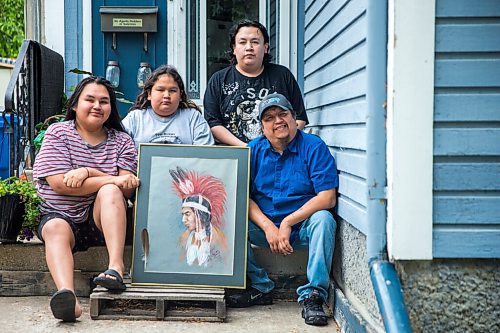MIKAELA MACKENZIE / WINNIPEG FREE PRESS

Jayden (left), Jimmie, Jackson III, and father Byron Beardy pose for a portrait with a portrait of Jackson Beardy (Byron's father) on the front steps of their home in Winnipeg on Thursday, June 18, 2020. 
Winnipeg Free Press 2020.