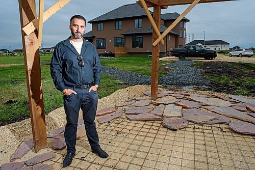 JESSE BOILY  / WINNIPEG FREE PRESS
Ricky Brar, who recently built his home in West St. Paul and has found it difficult to find landscapers, poses in front of the working progress in his backyard on Thursday. Thursday, June 18, 2020.
Reporter: Kellen Taniguchi