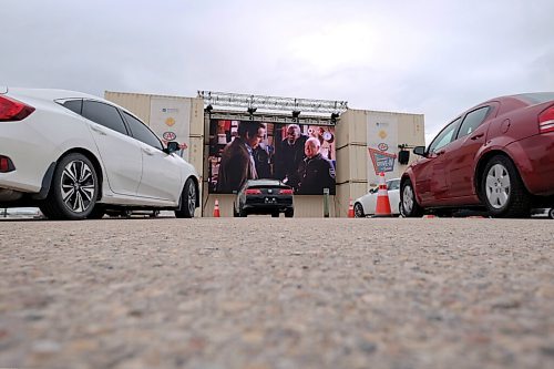 SHANNON VANRAES / WINNIPEG FREE PRESS
A partnership between AVentPro, CAA Manitoba and the Winnipeg Airport Authority has brought a drive-in movie theatre to an airport parking lot. Motorists watched Night at the Museum on June 18, 2020.