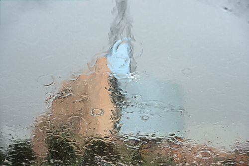 Mike Sudoma / Winnipeg Free Press
An outline of The Canadian Museum for Human Rights behind a wet glass window during a rain filled Saturday afternoon
June 20, 2020