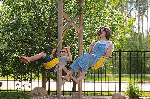 Mike Sudoma / Winnipeg Free Press
Choir singers Mabel and Henry Harrington take some time to swing on the swings as their schedules have a lot more free time these days as singing in their choirs is still on hold because of CoVid 19.
June 20, 2020