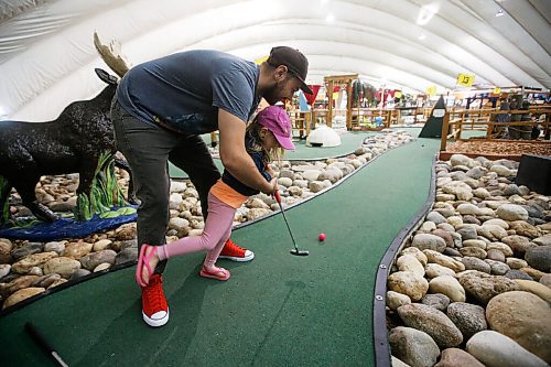 JOHN WOODS / WINNIPEG FREE PRESS
Marcus Gooch took advantage of COVID-19 phase 3 opening and plays mini-golf with his daughter Olivia, 3, at The Golf Dome on Fathers Day Sunday, June 21, 2020. 

Reporter: Rutgers