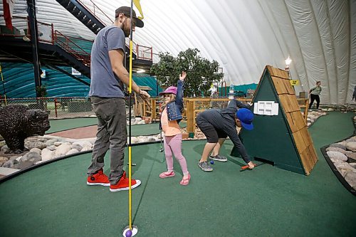 JOHN WOODS / WINNIPEG FREE PRESS
Marcus Gooch gets a high-five from his daughter Olivia, 3, as she sinks her ball as they take advantage of COVID-19 phase 3 opening and play mini-golf with her cousin Quinn, 7, at The Golf Dome on Fathers Day Sunday, June 21, 2020. 

Reporter: Rutgers