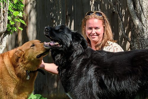 JESSE BOILY  / WINNIPEG FREE PRESS
Yvonne Kipling, with her rescue dogs Jimbo, left,  and Murphy, pose for a photo outside her home on Monday. Kipling is donating 50 per cent of her earnings from photography to the Winnipeg Pet Rescue Shelter. Monday, June 22, 2020.
Reporter: Doug Speirs