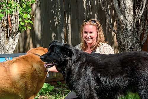 JESSE BOILY  / WINNIPEG FREE PRESS
Yvonne Kipling, with her rescue dogs Jimbo, left,  and Murphy, pose for a photo outside her home on Monday. Kipling is donating 50 per cent of her earnings from photography to the Winnipeg Pet Rescue Shelter. Monday, June 22, 2020.
Reporter: Doug Speirs