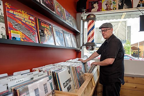 JESSE BOILY  / WINNIPEG FREE PRESS
Steve Ward, the owner of Hi Tone Records, poses for a portrait in his downtown Selkirk store on Tuesday. Steve shares the space with his wife Angela Ward who runs a barber shop at the back of the store.  Tuesday, June 23, 2020.
Reporter: Dave Sanderson