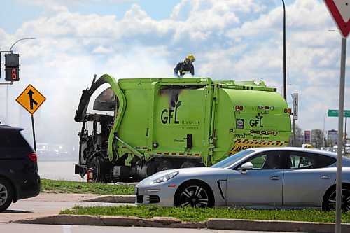 RUTH BONNEVILLE / WINNIPEG FREE PRESS

Local - Standup GFL Truck Fire

Fire Crews work to put out a fire inside a GFL garbage truck at the corner of Kenaston Blvd. and Lindenwoods Dr. Tuesday afternoon.  

June 23,  2020