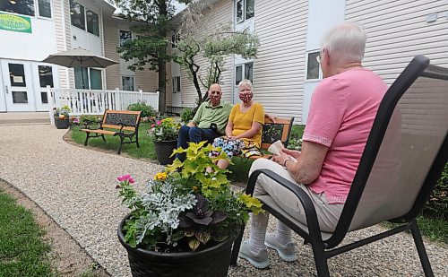 RUTH BONNEVILLE / WINNIPEG FREE PRESS

LOCAL - care homes

Joyce Church, a resident of Thorvaldson Care Centre, enjoys visiting with her daughter, Janis Brackman and her son-in-law Alan Brackman, in the outdoor patio space at her residence on Tuesday.  

What: Family members can now visit their loved ones in personal care homes (COVID-19 restrictions are changing).

See Gabby's story. 

.June 23,  2020